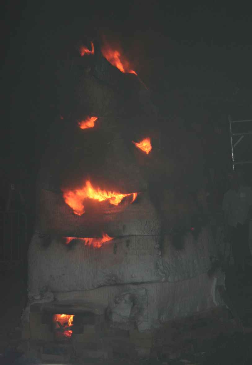 Ceramic form being fired in fibre blanket cover